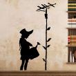 Wall decals design - Wall decal girl with a watering can - ambiance-sticker.com