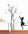Young girl playing near a tree with butterflies flying around sticker - ambiance-sticker.com